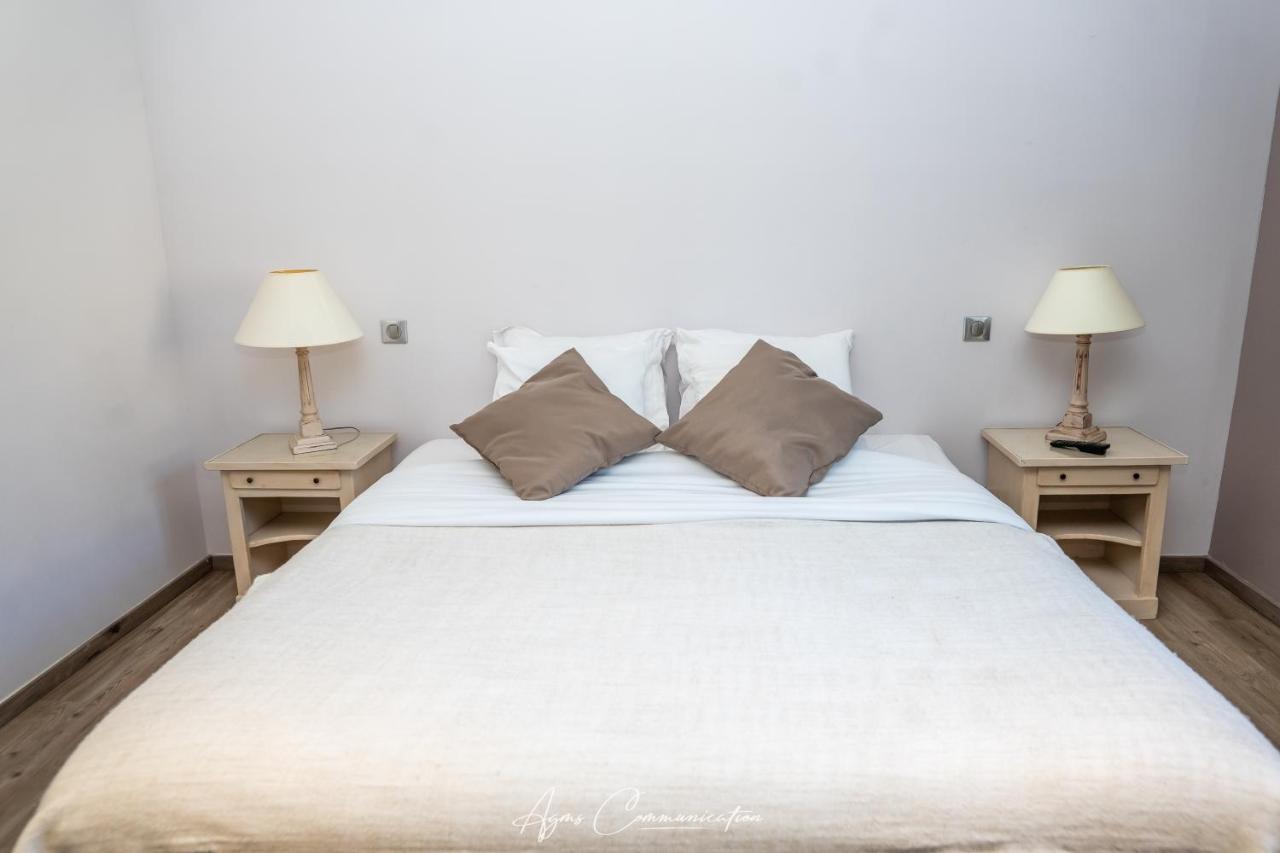 Logis Du Champ De Mars Hotel Puy-Saint-Martin Eksteriør billede
