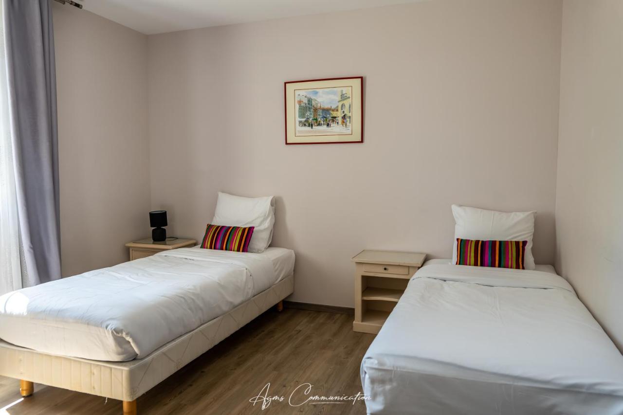 Logis Du Champ De Mars Hotel Puy-Saint-Martin Eksteriør billede
