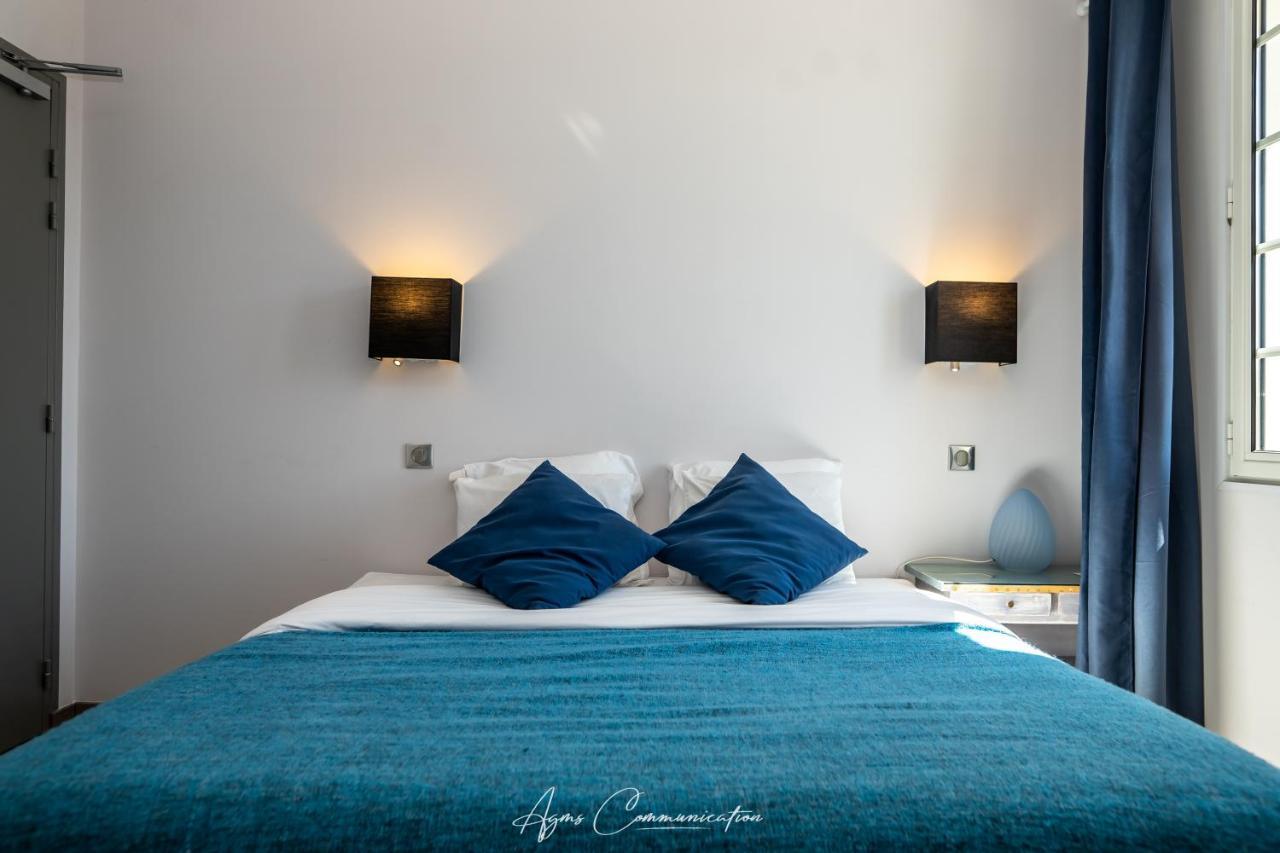 Logis Du Champ De Mars Hotel Puy-Saint-Martin Eksteriør billede